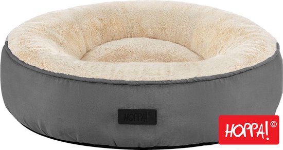 Panier rond pour chien anthracite avec intérieur peluche beige. La marque "Hoppa!" est visible sur une étiquette noire.