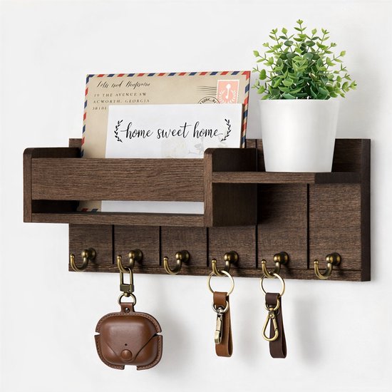 Donkerbruin sleutelrek van hout met een plank voor post en 6 haken met messingkleurige afwerking.