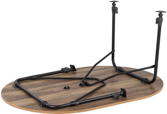 Onderkant van een ovale tafel met bruin houtnerfprint blad en uitklapbaar zwart metalen onderstel.
