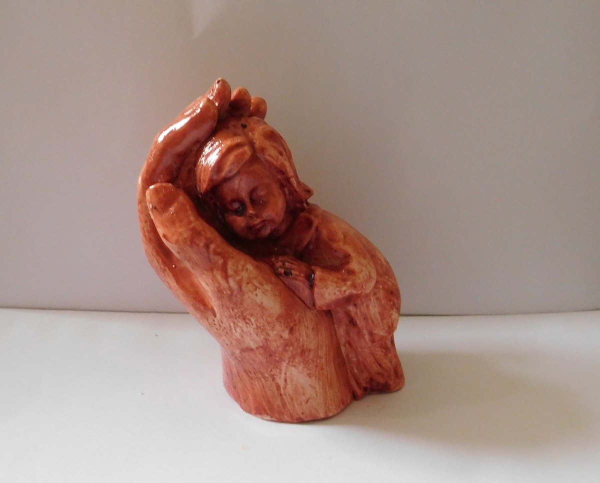Beeld Kindje in hand