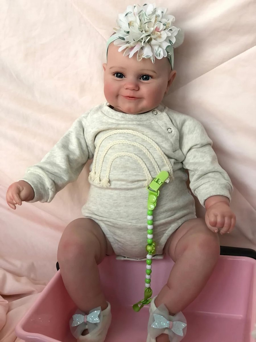 Realistisch 19 inch Reborn Baby Pop met Bloemige Hoofdband en Knuffelbaar Lichaam