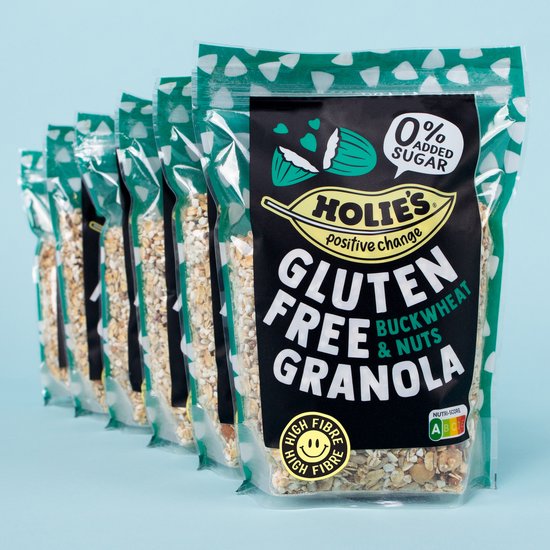 Rij van Holie's glutenvrije granola verpakkingen met boekweit en noten. "0% toegevoegde suiker".