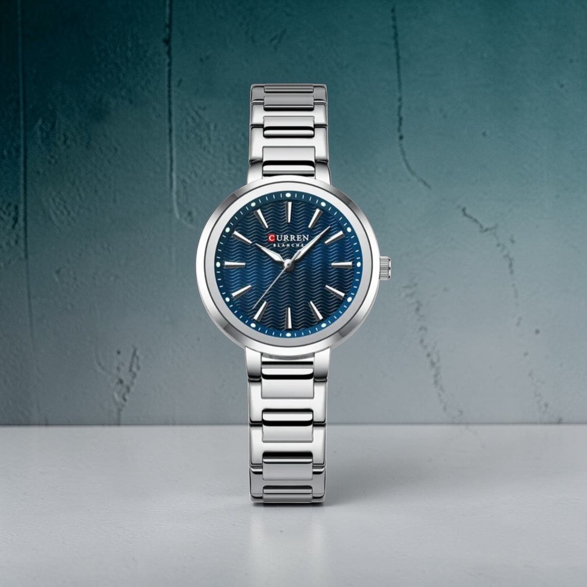 CURREN 9109 Dameshorloge Zilverkleurig Met Blauwe Wijzerplaat - Quartz Polshorloge met RVS Band, Lume Wijzers, Golfpatroon en 3ATM Waterbestendig - 5 Kleurvarianten - 32mm Dial