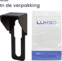 Zwarte beschermkap voor deurbel, naast een transparante verpakking met 'LUX3D' logo.