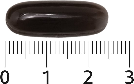 Eén donkerbruine capsule met liniaal.