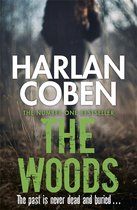 Boek 'The Woods' van Harlan Coben. De achtergrond is een wazige figuur in een bosrijke omgeving.