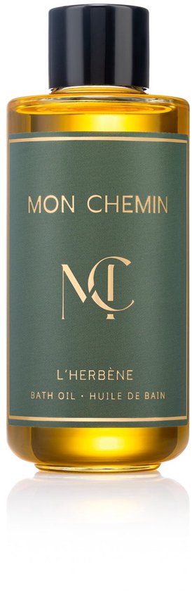 Mon Chemin L'Hérebène badolie in een glazen fles met groene etiket.