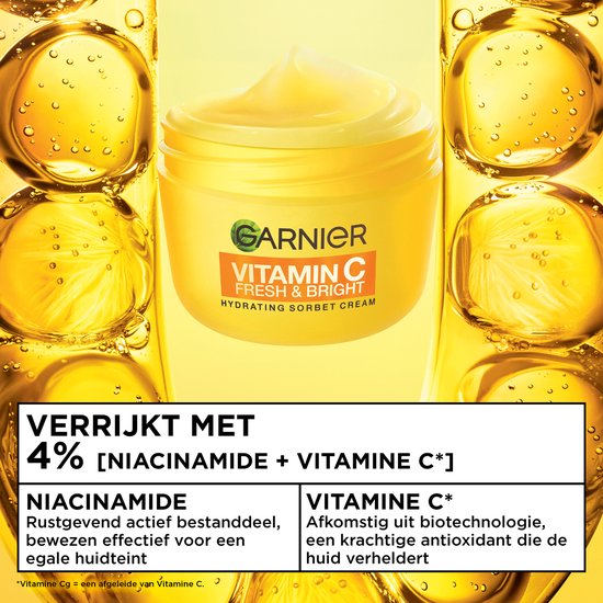 Garnier Vitamin C Fresh & Bright hydraterende sorbetcrème in gele pot, omringd door waterdruppels.