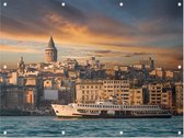 Zicht op een veerboot en de Galatatoren in Istanbul - Foto op Tuinposter - 100 x 75 cm