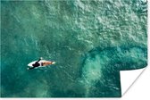 Surfer die peddelt poster papier 120x80 cm - Foto print op Poster (wanddecoratie woonkamer / slaapkamer)