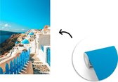 Behang - Fotobehang Blauw voetpad in Santorini Griekenland - Breedte 175 cm x hoogte 260 cm