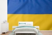 Behang - Fotobehang Close-up van de vlag van Oekraïne - Breedte 330 cm x hoogte 220 cm