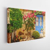 Canvas schilderij - Stone house in Greek style with a blue wooden door, bushes and flowers  -     1672767700 - 50*40 Horizontal