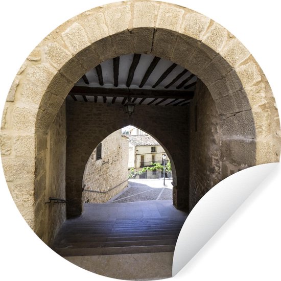 Arche de pierre dans un quartier médiéval espagnol Sticker mural cercle