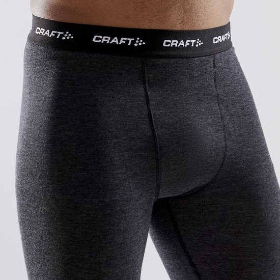 Close-up van de donkere antraciet thermobroek met logo tailleband.