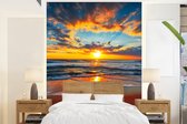 Behang - Fotobehang Zee - Zonsondergang - Strand - Wolken - Oranje - Breedte 175 cm x hoogte 240 cm