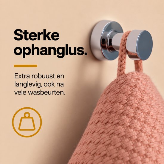Roze handdoek met sterke ophanglus aan een verchroomde haak. Tekst: Sterke ophanglus, extra robuust en langlevig.
