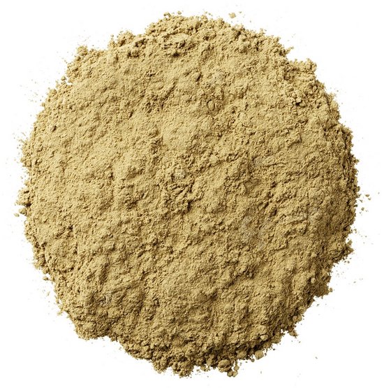 Een hoopje fijn gemalen beige kruidenpoeder met een grove textuur.