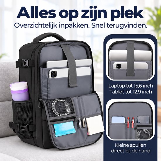Interieur van zwarte reistas met gevoerd laptopvak tot 15,6 inch, tabletvak en organisatievakjes.