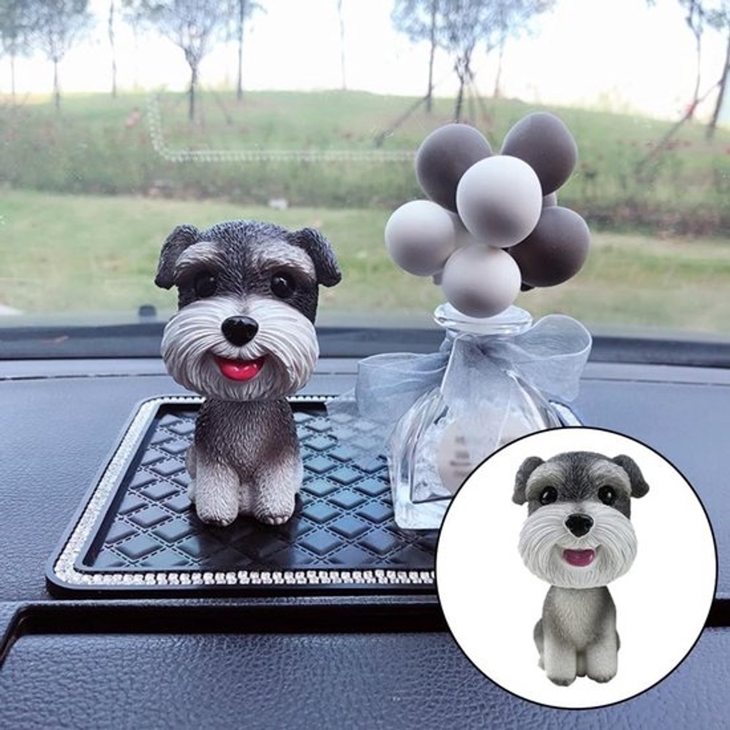 Schattige miniatuur hond met bobblehead - Knikkend beeldje voor autodashboard