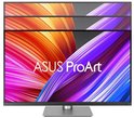 Vooraanzicht ASUS ProArt monitor met abstract kleurrijk display op zilveren voet.