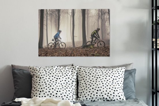 En VTT sur un chemin forestier 90x60 cm - Tirage photo sur toile (Décoration murale salon / chambre)