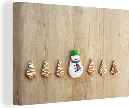 Canvas schilderij 60x40 cm - Wanddecoratie kerstkoekjes - Muurdecoratie woonkamer - Slaapkamer decoratie - Kamer accessoires - Schilderijen op canvas - Kerstdecoratie voor binnen - Kerstversiering - Kerstmis versiering