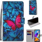Voor Samsung Galaxy A21 Gekleurde tekening Cross Texture Horizontale Flip PU lederen tas met houder & kaartsleuven & portemonnee & lanyard (grote rode vlinder op blauw)