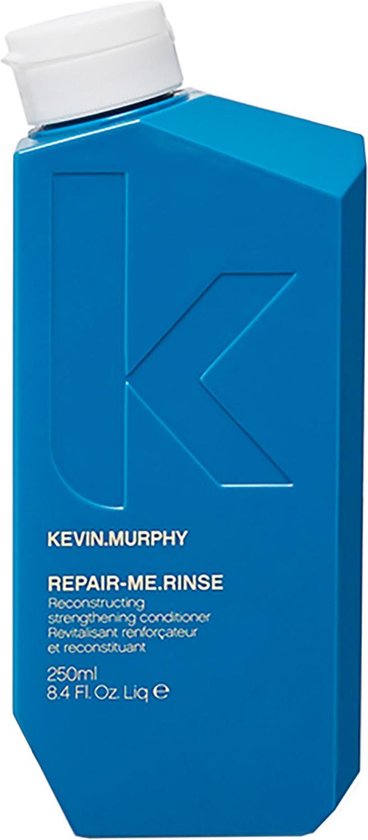 Bouteille bleue KEVIN.MURPHY REPAIR-ME.RINSE avec bouchon blanc.