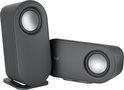 Twee zwarte Logitech speakers, één verticaal en één horizontaal.