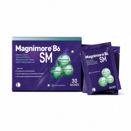 Een paarse doos en drie paarse sachets van "Magnimore B6 SM". De doos en sachets tonen groene bolletjes.