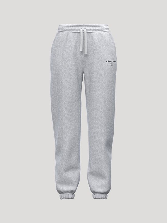 Lichtgrijze joggingbroek met tekst 'BJÖRN BORG' op de linkerheup, trekkoord en elastische tailleband en broekspijpen.