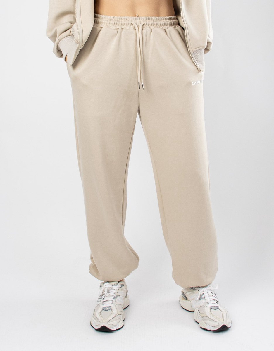 Serenity Cooldry Jogger | CAPO FINALE - Jogger | S | Kleur Beige | Sportkleding | Activewear | Gymkleding | Fitnesskleding | Sportoutfit | Fitness | Hardlopen | Crossfit | Yoga | Pilates | Krachttraining