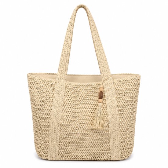 Sac cabas beige tressé avec pompon décoratif et anses.