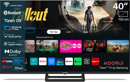 Een platte zwarte tv met een standaard toont het "Fallout"-startscherm en diverse streaming-apps.