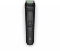 Zwarte Philips All-in-One trimmer met groen mesje, aan/uit-knop en indicatorlampje.