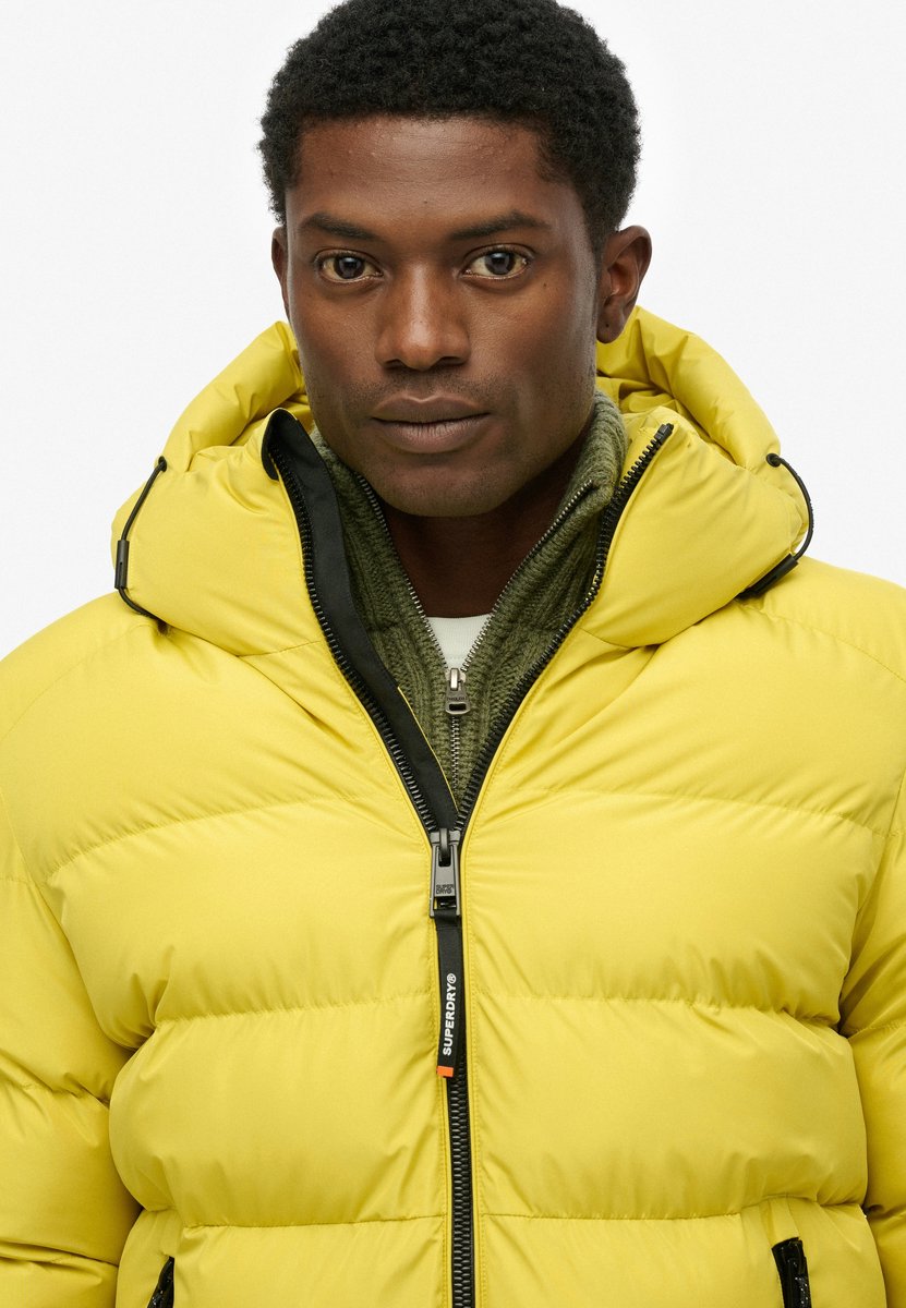 Superdry Sportieve Capuchon Pufferjas Heren Gewatteerde jassen Geel