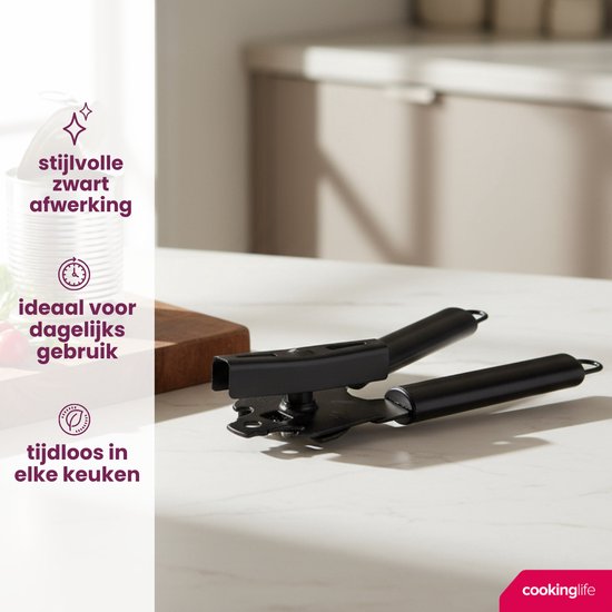 Een zwarte blikopener met zwarte handvatten op een keukenblad.