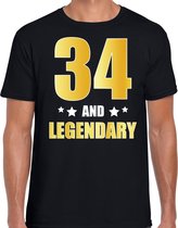 34 and legendary verjaardag cadeau t-shirt / shirt - zwart - gouden en witte letters - voor heren - 34 jaar verjaardag kado shirt / outfit S