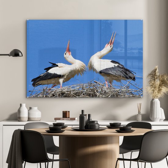MuchoWow® Peinture sur verre 90x60 cm - Peinture sur verre acrylique - Belle image de deux cigognes dans leur nid - Photo sur verre - Peintures