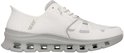 Naturel Skechers Glide-Step Pro instapper opzij gezien, met grijze, opengewerkte zool.