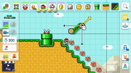 Mario staat op een trap met vuurballen. De speler bouwt met pijlen en een zwevend object.