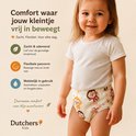 Lachend meisje met een oefenbroekje met aapjesprint.