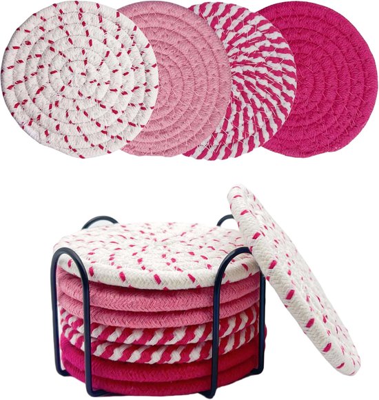 Set van acht ronde gevlochten katoenen onderzetters in verschillende roze tinten, met houder.