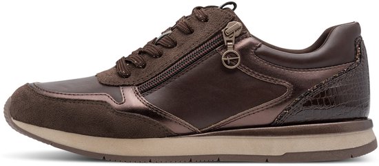 Bruine damessneaker met rits, veters en metallic accenten.