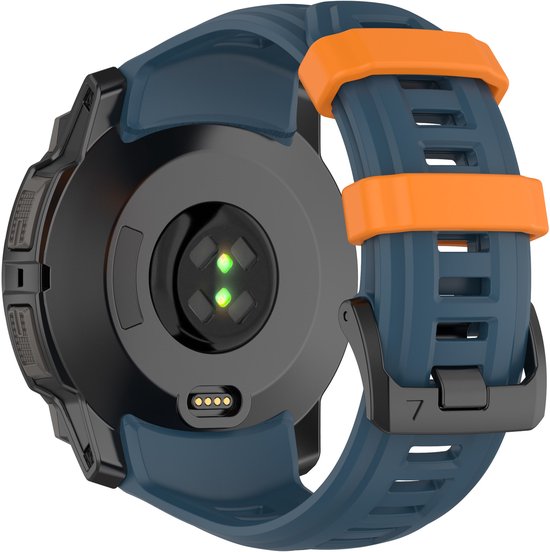 Achterkant van een horloge met blauwe band, oranje keepers en hartslagsensor.
