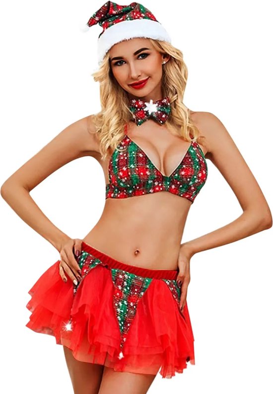 Vrouw met kerstmuts, strikje en kerstsetje aan met rood met groene ruitjesprint en witte sneeuwvlokken, rode tule rok.