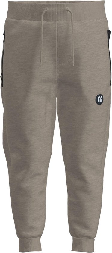 Grijze joggingbroek met zwarte ritszakken en een trekkoord.