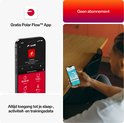 Polar Loop activity tracker, bruin koper, met de Polar Flow app op een smartphone.