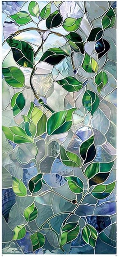 Gedetailleerde close-up van decoratieve raamfolie met groene bladeren.